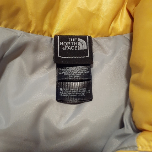 The North Face 550 down Vest.  Size small, yellow color - Picture 5 of 6
